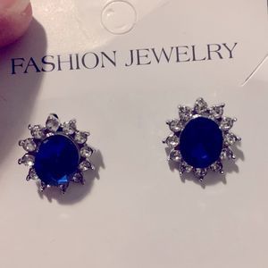 Beautiful brown CZ earrings surrounded by CZ clear stones.